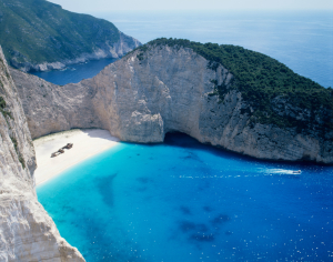 Aerial view of Navagio Beach and Shipwreck of the Panagiotis at 'Smugglers Cove' on the coast of Zakynthos in the Ionian Islands Courtesy: Creative commons